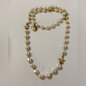 Vintage gold tone pearl necklace with gold starfish. Long necklace